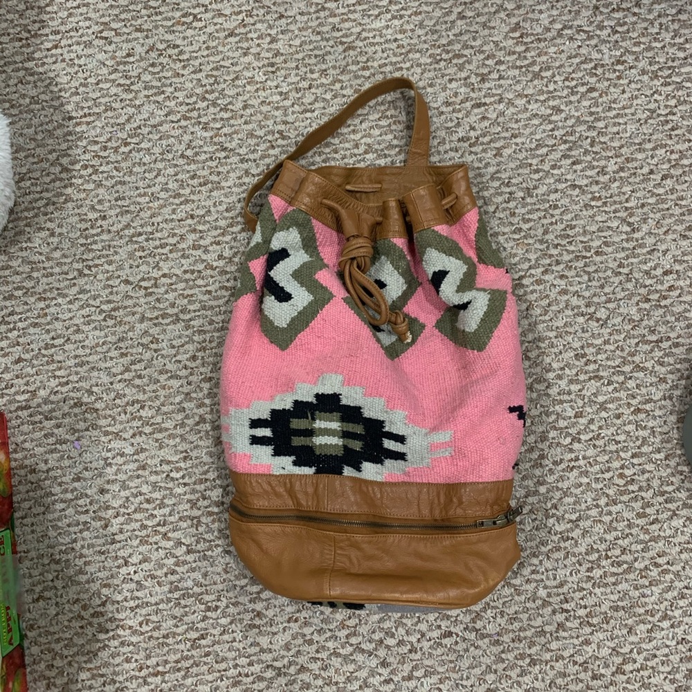 Urban Outfitters Pink patterned one strap backpack